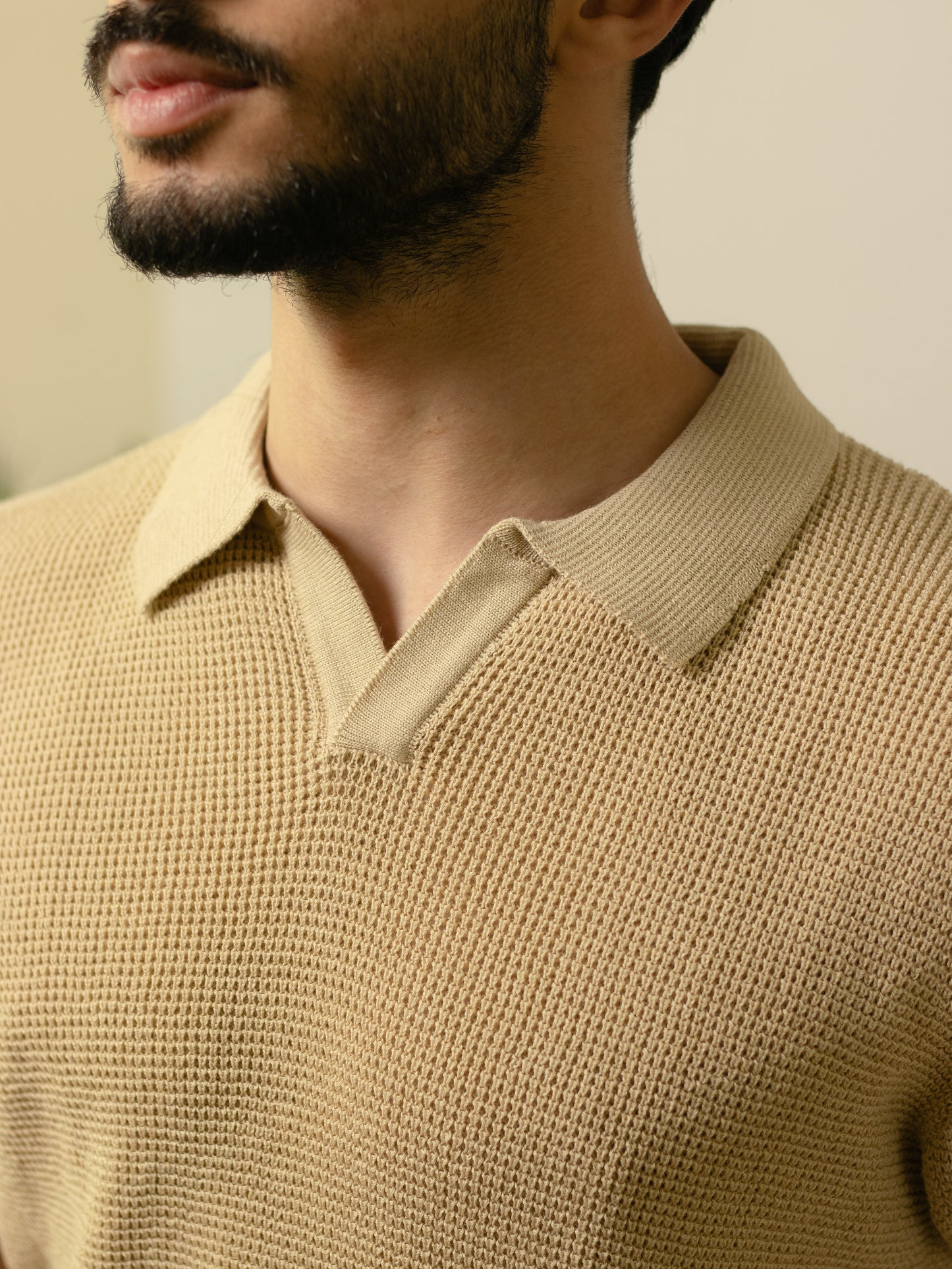 Unisex beige knitted polo