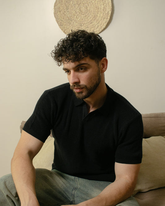 Unisex black knitted polo