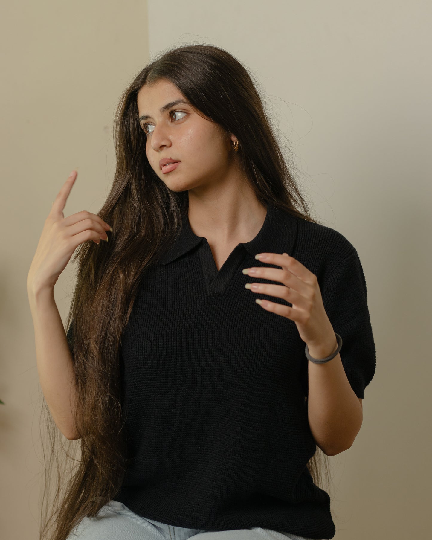 Unisex black knitted polo