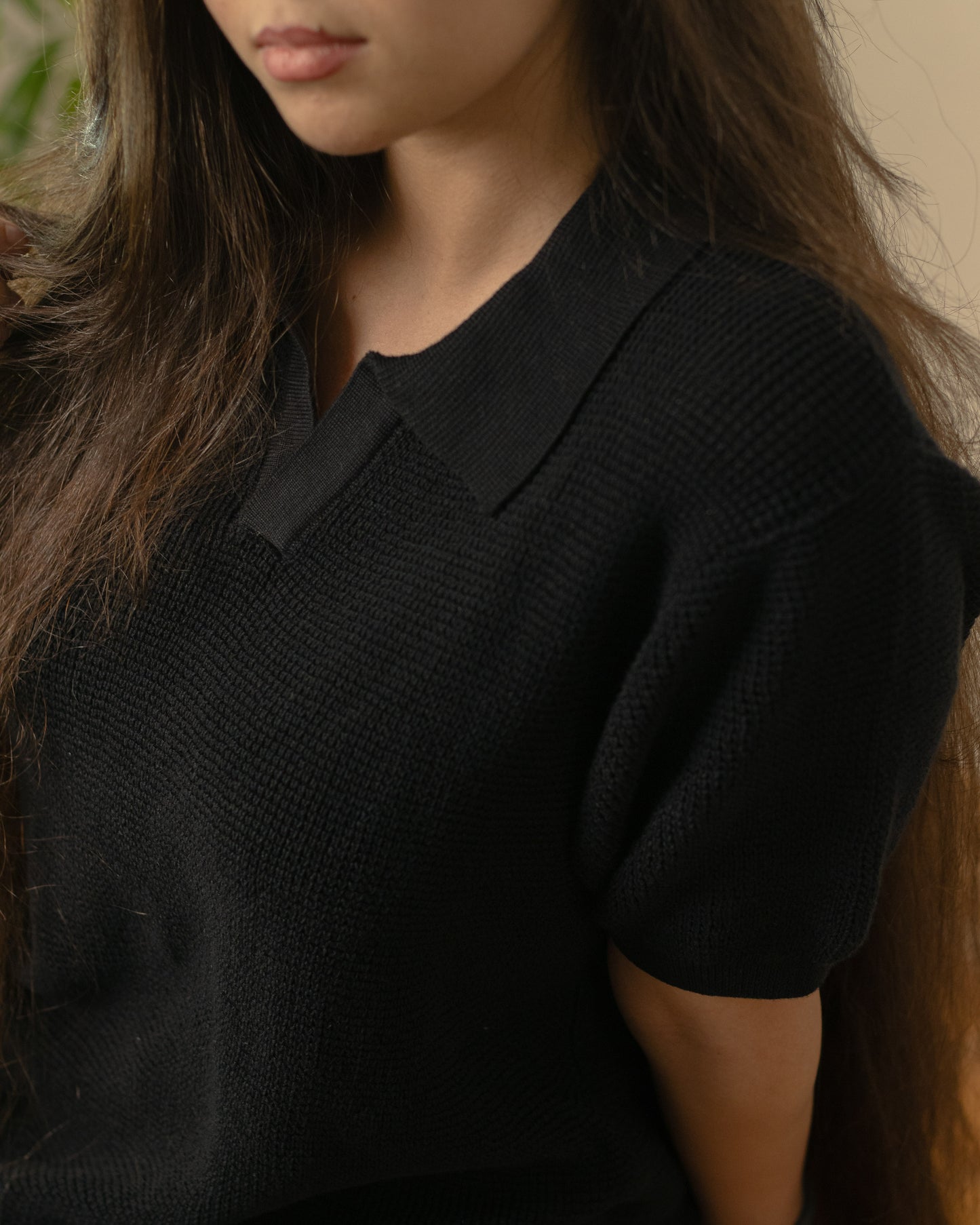 Unisex black knitted polo