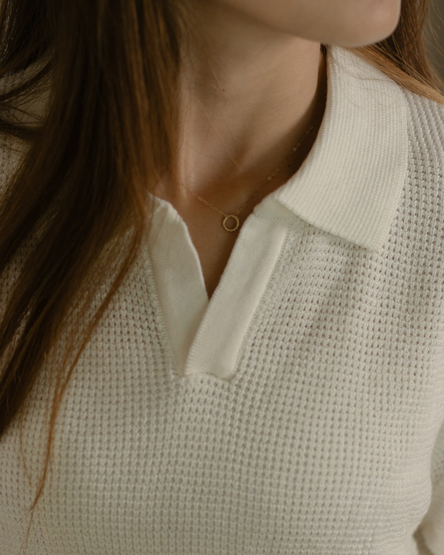 Unisex white knitted polo