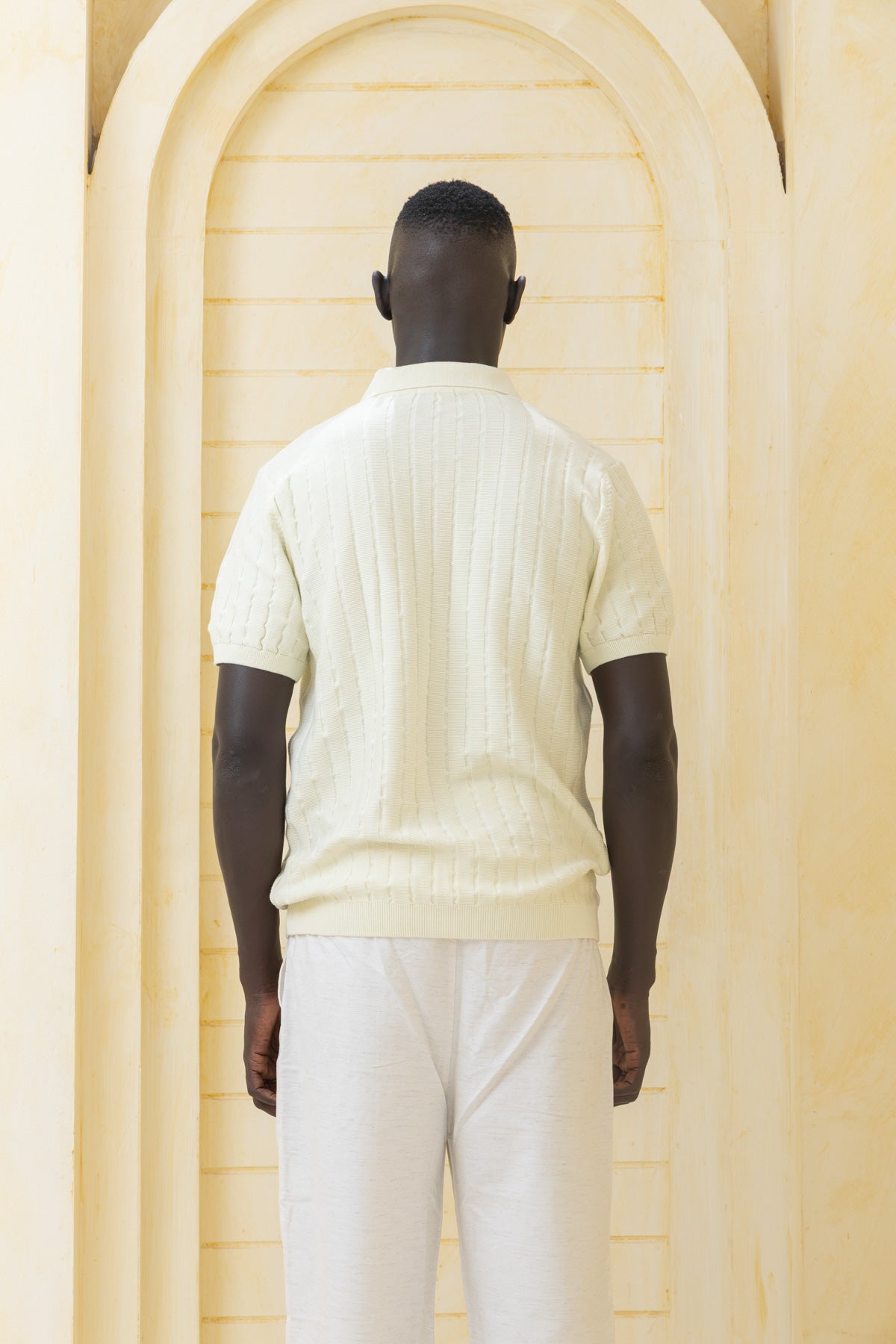 Unisex off-white knitted polo