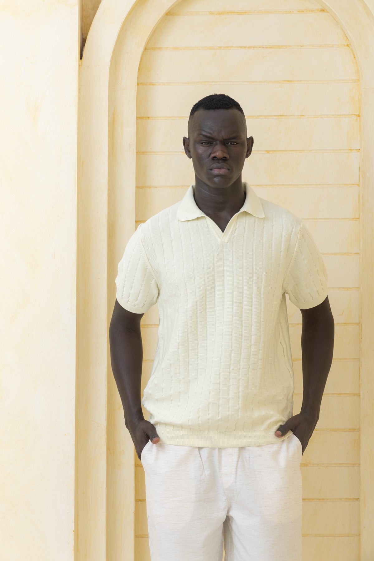 Unisex off-white knitted polo